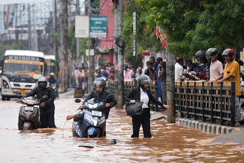 | Photo: AP/Anupam Nath : Monsoon Rains in Guwahati