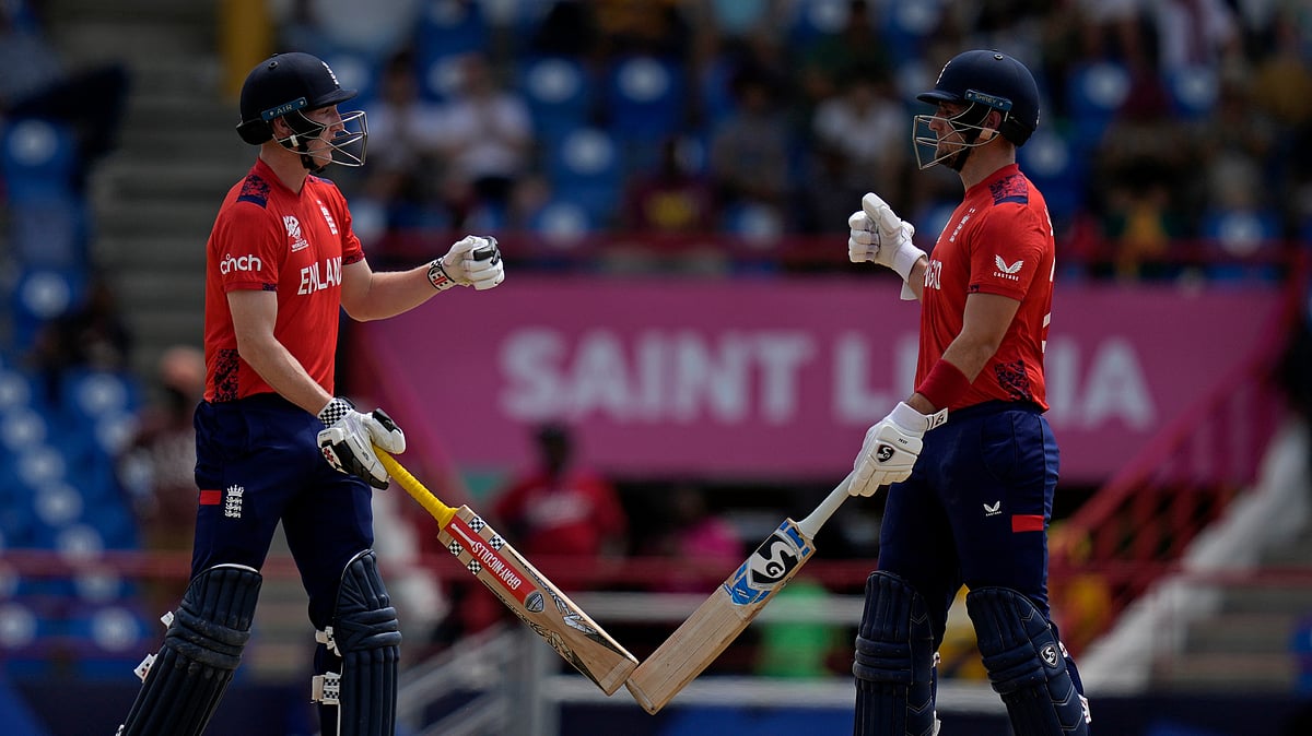 AP Photo/Ramon Espinosa : England's Harry Brook, left, and batting partner Liam Livingstone celebrate scoring runs during the ICC Men's T20 World Cup cricket match between England and South Africa at Darren Sammy National Cricket Stadium in Gros Islet, Saint Lucia.