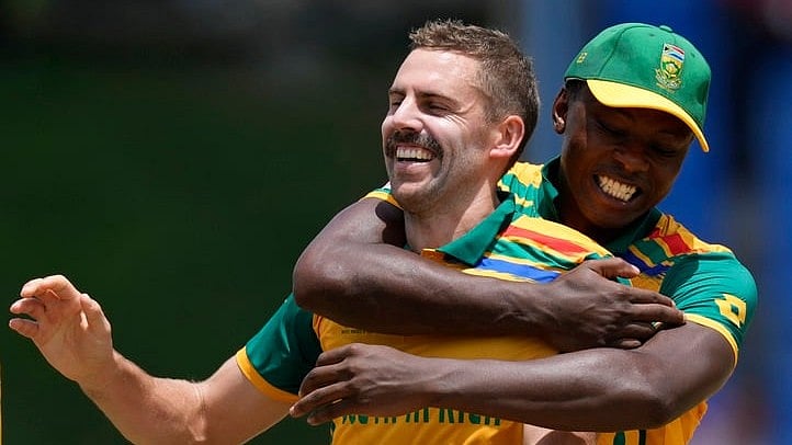 South Africa's Anrich Nortje, left, celebrates with teammate Kagiso Rabada after the dismissal of United States' Corey Anderson during the ICC Men's T20 World Cup cricket match between the United States and South Africa at Sir Vivian Richards Stadium in North Sound, Antigua and Barbuda, Wednesday, June 19, 2024. - AP/Ricardo Mazalan