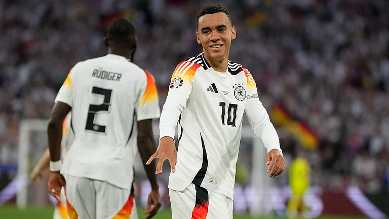 GER's Jamal Musiala in action against SCO at the Euro 2024. - AP/Matthias Schrader