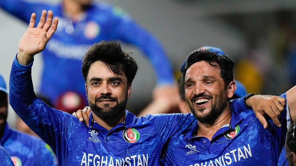 AP/Ricardo Mazalan : Rashid Khan (left) and Gulbadin Naib celebrate Afghanistan's win over Bangladesh and their semi-final berth at ICC T20 World Cup 2024, in Saint Vincent on Tuesday (June 25).