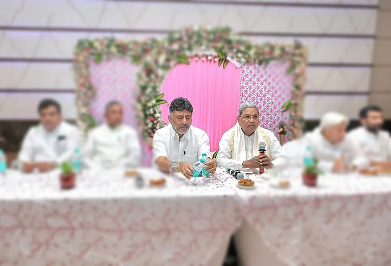 Karnataka Chief Minister Siddaramaiah with his deputy DK Shivakumar (L) - null