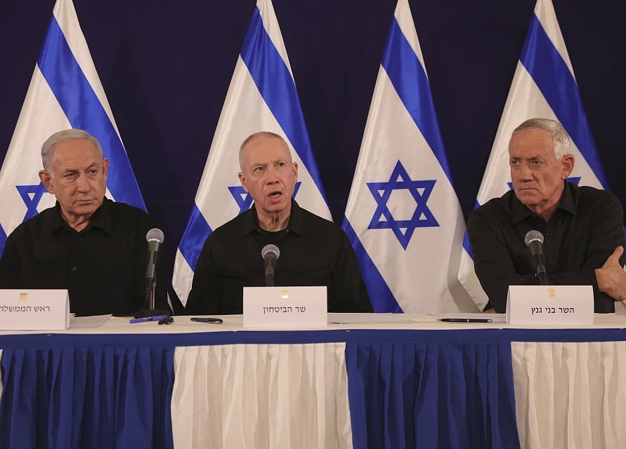 Abir Sultan/Pool Photo via AP, File : From left, Israeli Prime Minister Benjamin Netanyahu, Defense Minister Yoav Gallant and Cabinet Minister Benny Gantz speak during a news conference in the Kirya military base in Tel Aviv, Israel on Oct. 28, 2023. Israeli officials said Monday, June 17, 2024, that Netanyahu has dissolved the influential War Cabinet that was tasked with steering the war in Gaza. 
