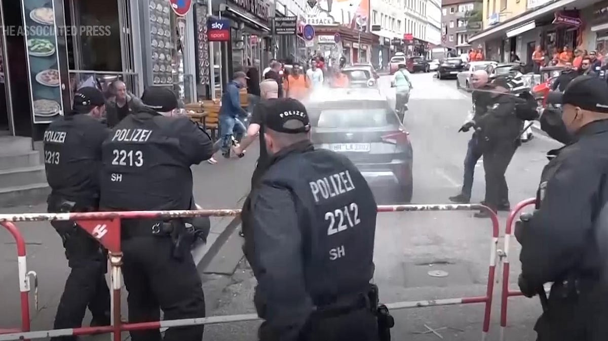 AP Screengrab : Hamburg Police Shoot Man With Axe Ahead Of Euros Match |