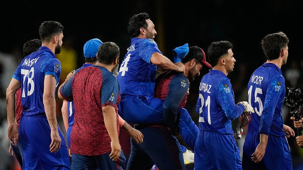 AP/Ramon Espinosa : Afghanistan celebrate their historic victory over Australia at the ICC T20 World Cup 2024 Super Eights in Kingstown, St Vincent on Sunday (June 23).