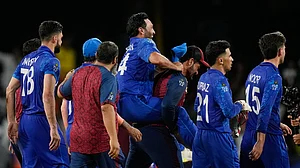 AP/Ramon Espinosa : Afghanistan celebrate their historic victory over Australia at the ICC T20 World Cup 2024 Super Eights in Kingstown, St Vincent on Sunday (June 23).