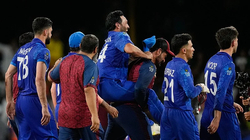 Afghanistan celebrate victory over Australia, ICC T20 World Cup 2024 Super 8, AP photo