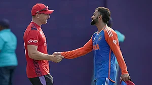 AP : India's Virat Kohli shakes hands with England's captain Jos Buttler after the second semi-final of ICC T20 World Cup 2024 in Guyana.