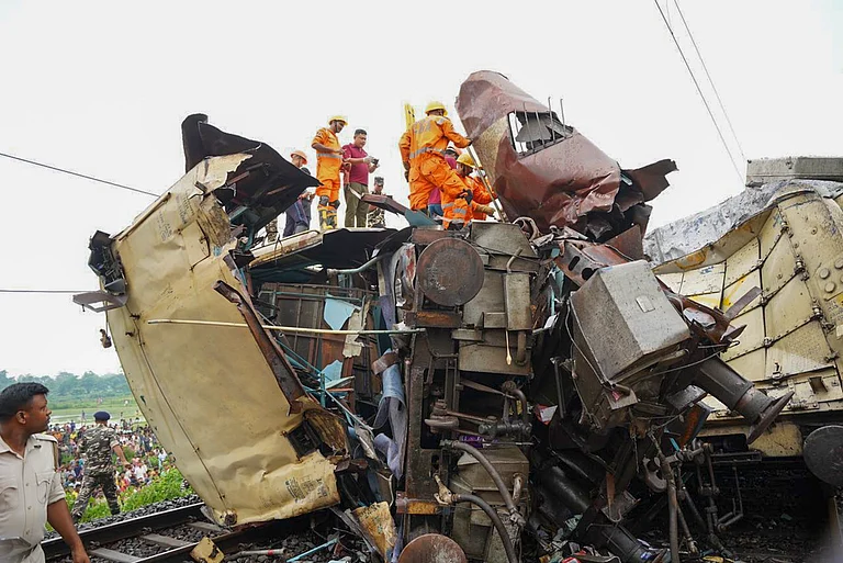 Mangled bogies of a train involved in the Kanchanjunga Express-goods train collision accident on Monday - PTI