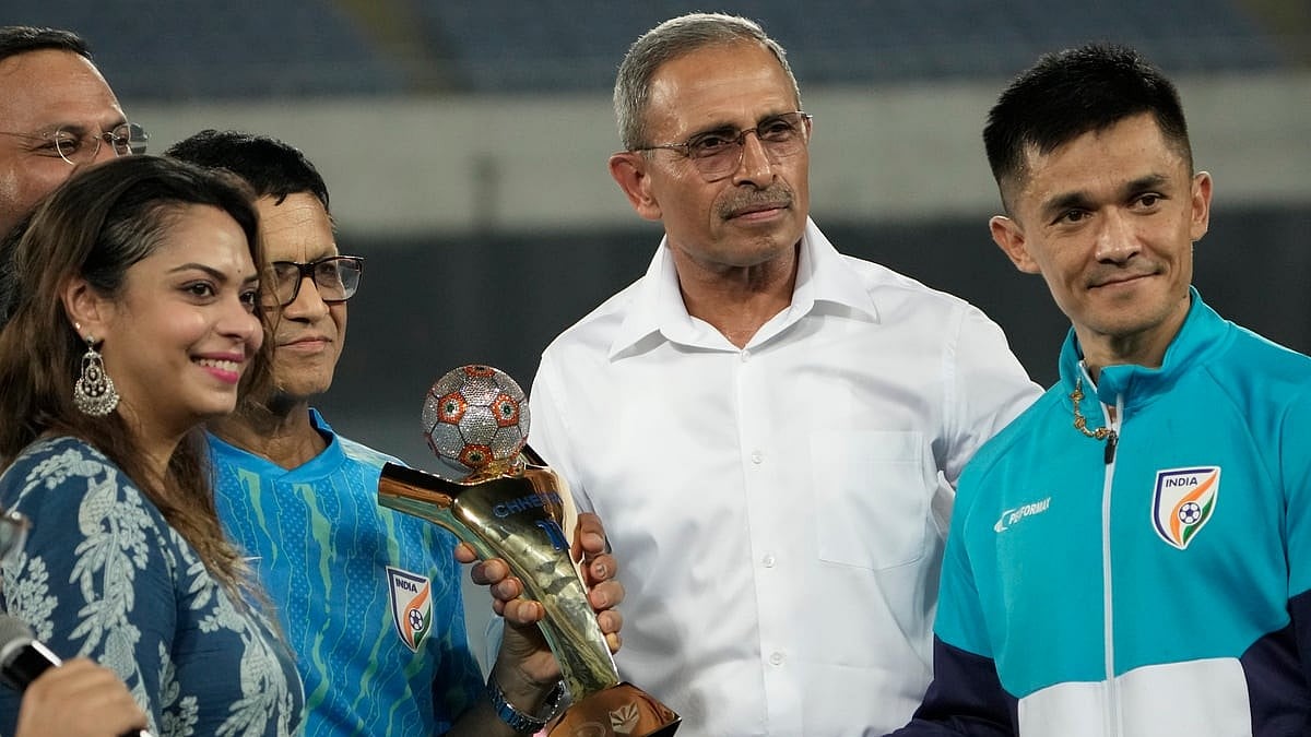 PTI Photo/Swapan Mahapatra : India's captain Sunil Chhetri with his wife Sonam Bhattacharya and other family members being felicitated as he retires from international football, after a FIFA World Cup 2026 Qualifier football match between India and Kuwait, at the Vivekananda Yuba Bharati Krirangan (Salt Lake Stadium), in Kolkata.