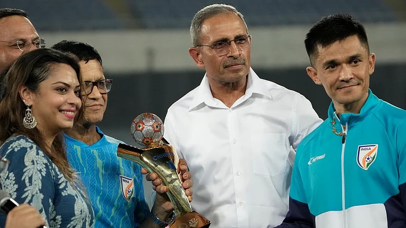 Indias captain Sunil Chhetri with his wife Sonam Bhattacharya and other family members being felicitated as he retires from international football. PTI Photo