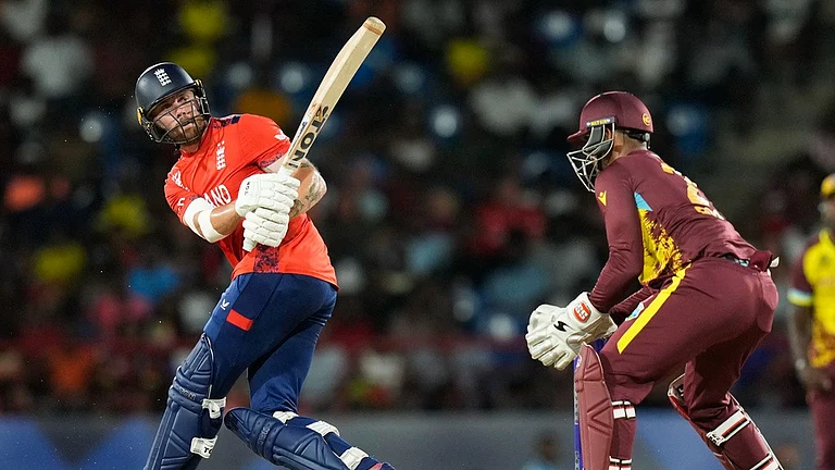 Phil Salt (left) bats during the England vs West Indies, T20 World Cup 2024 match in St Lucia.  - AP/Ramon Espinosa