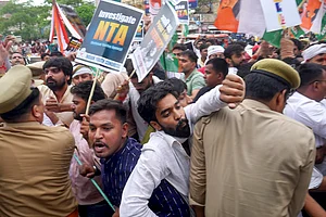 PTI : Protests over NEET row |