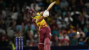 AP/Ricardo Mazalan : Shai Hope hits a big one during the USA vs West Indies, ICC T20 World Cup 2024 match in Barbados.