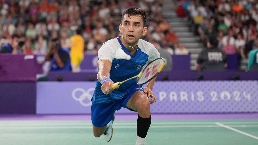 Lakshya sen in action during his match against Jonatan Christie at Paris Olympics. - AP/Dita Alangkara
