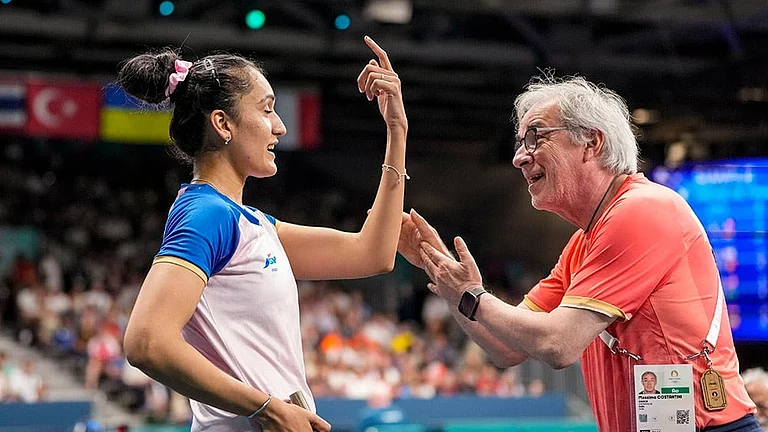 Manika Batra with her German coach Chris Pfeiffer at the Paris Olympics. - | Photo: PTI/Ravi Choudhary