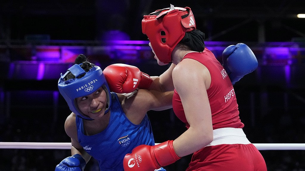 AP : India's Lovlina Borgohain (left) in action against Norway's Sunniva Hofstad in her opening bout in Paris on Wednesday.