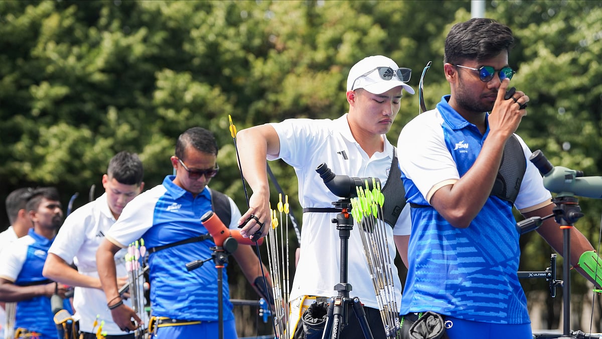 PTI Photo/Ravi Choudhary : India's archers Dhiraj Bommadevara, Tarundeep Rai and Pravin Jadhav compete during the ranking round of the men's archery event at the Paris 2024 Olympics, in Paris.