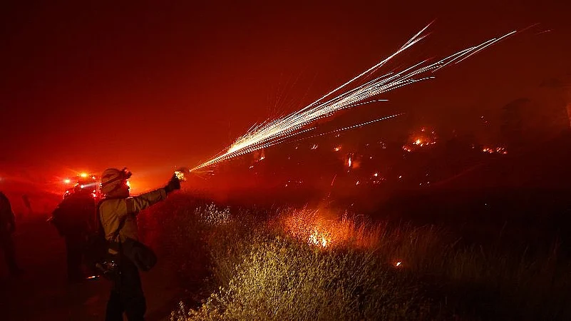Firefighters trying to contain Park fire.