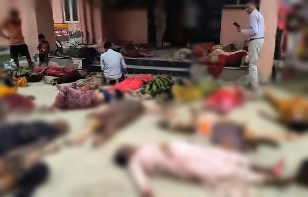 Heart-wrenching videos showed bodies of women who died in the Hathras stampede kept on floor of what appeared to be a medical facility.

 - null