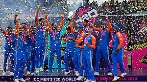 AP Photo/Ramon Espinosa : India's players celebrate with the winners' trophy after winning against South Africa in the ICC Men's T20 World Cup final cricket match at Kensington Oval in Bridgetown, Barbados.