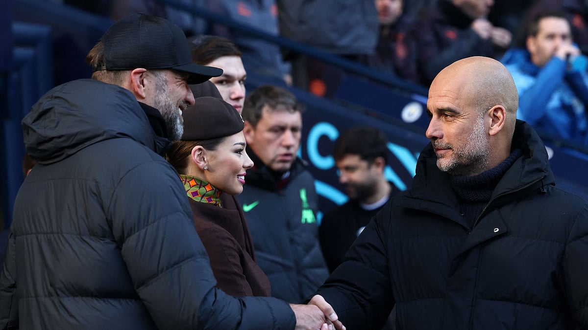 Old rivals Jurgen Klopp and Pep Guardiola have been linked with the England job - null