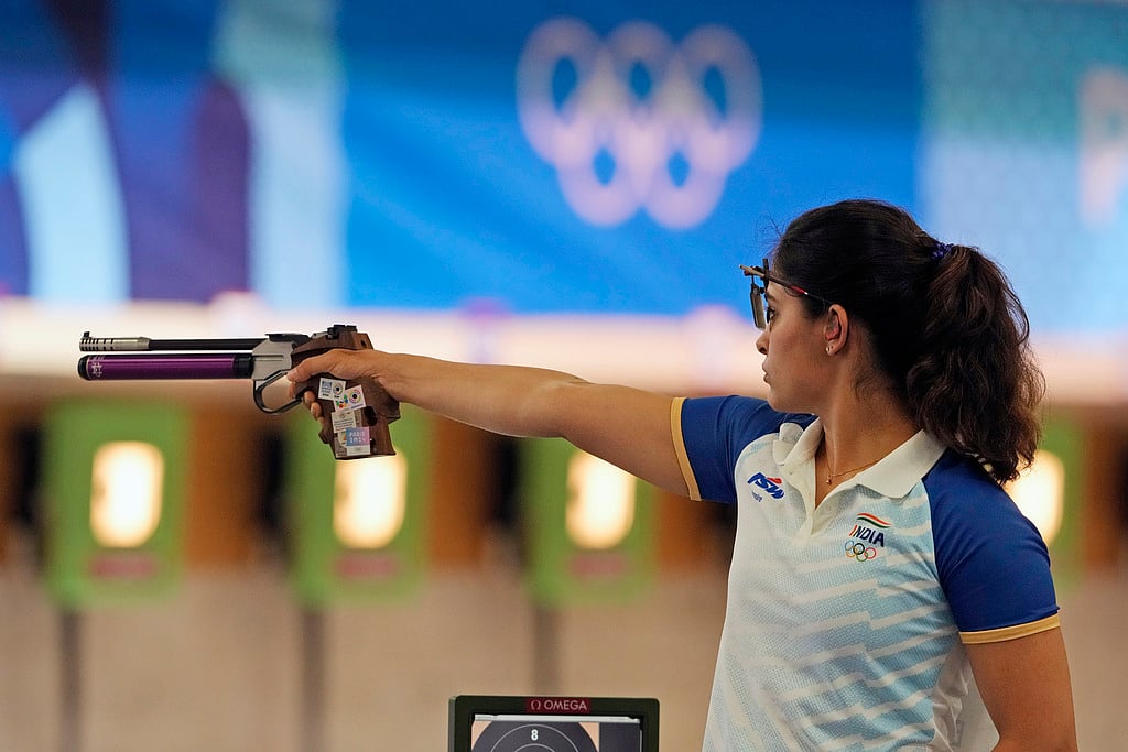 AP : India's Manu Bhaker competes in the 10m air pistol women's qualification round at the 2024 Summer Olympics, Saturday, July 27, 2024, in Chateauroux, France.