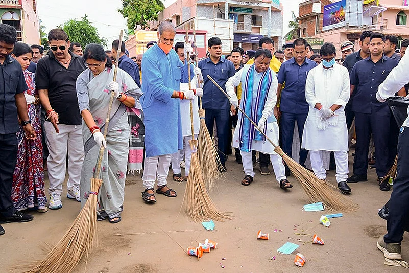 Odisha CM Mohan Charan Majhi during a cleanness drive ahead of Rath Yatra festival