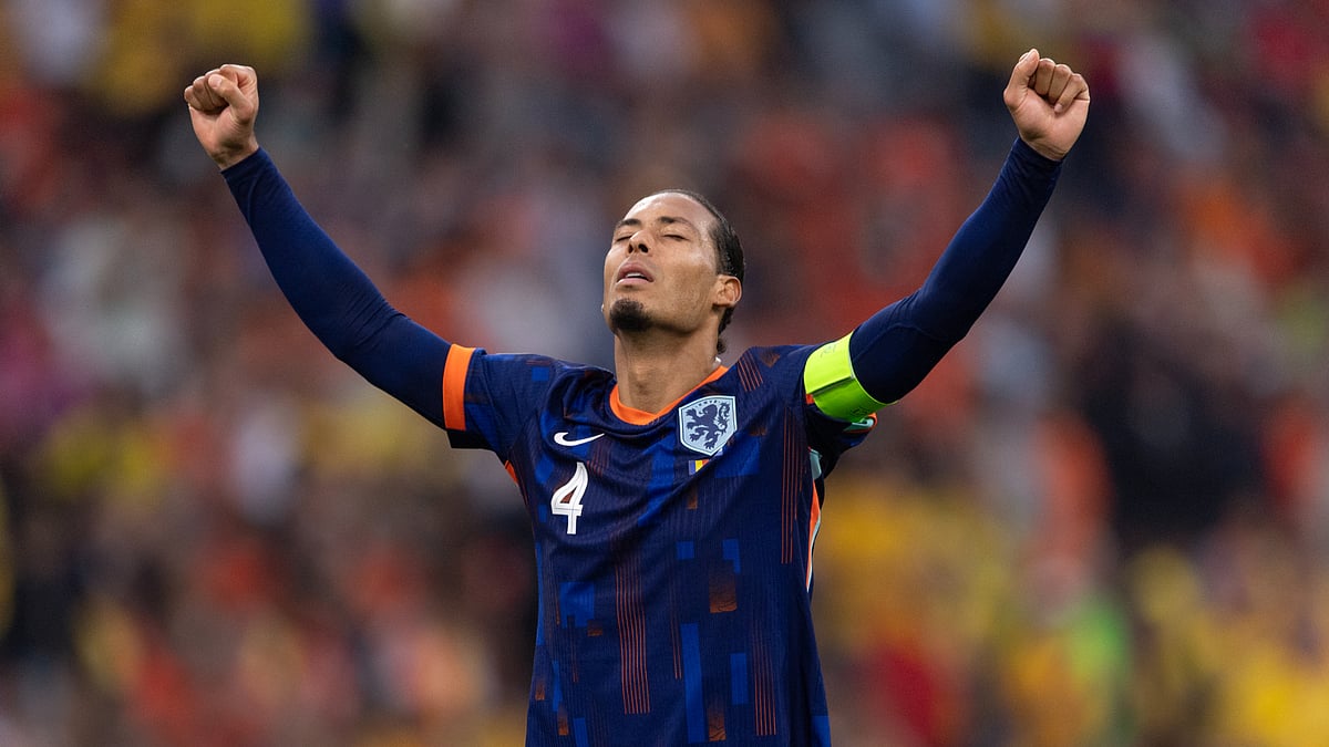 Virgil van Dijk celebrates Saturday's victory over Turkiye - null