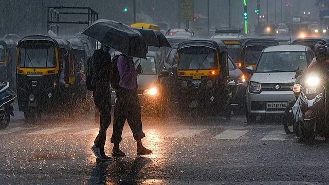 Rain Lashes Parts Of Delhi-NCR; - | Photo: PTI