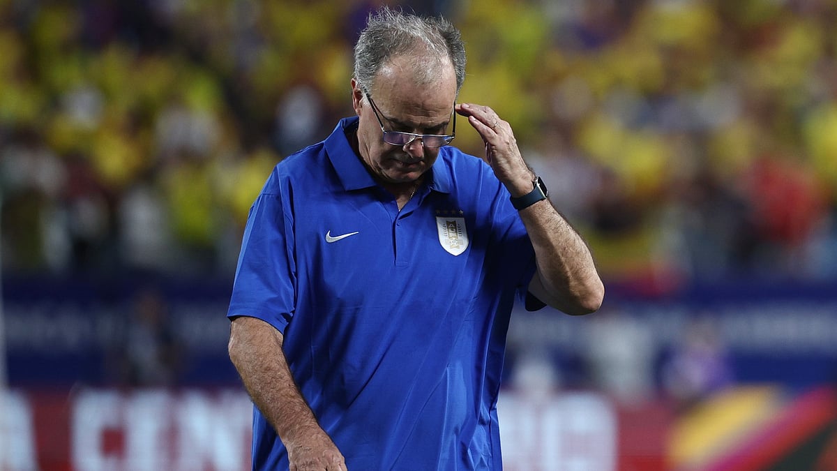 Marcelo Bielsa looks dejected after Uruguay's defeat - null