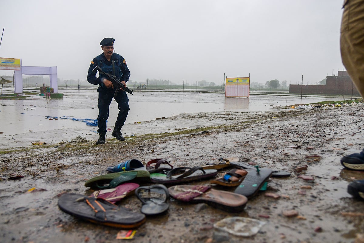 Slippers of victims at the stampede spot in Hathras | - PTI