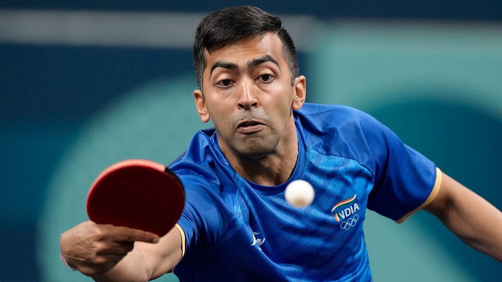 AP : India's Harmeet Desai plays against France's Felix Lebrun during a men's singles round of 64 table tennis game at the 2024 Summer Olympics, Sunday, July 28, 2024, in Paris, France.