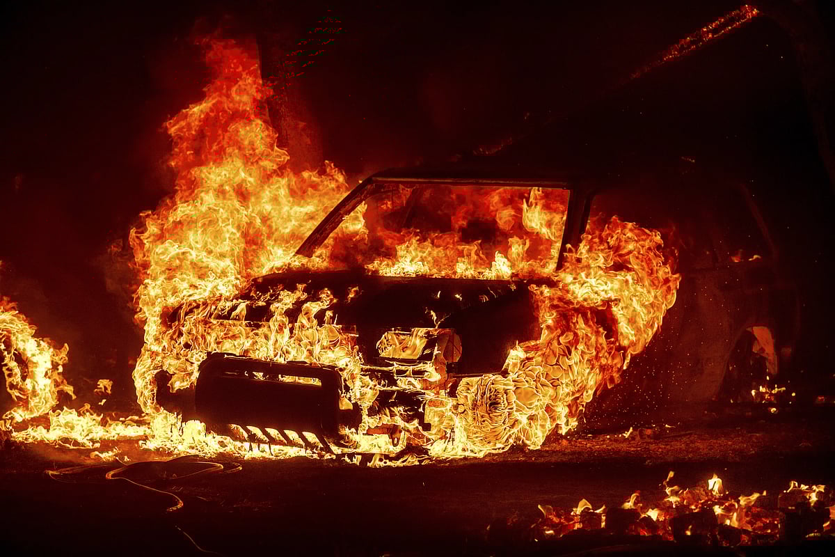 A car burning in fire.