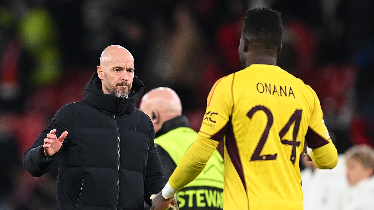 Manchester United manager Erik ten Hag with Andre Onana - null