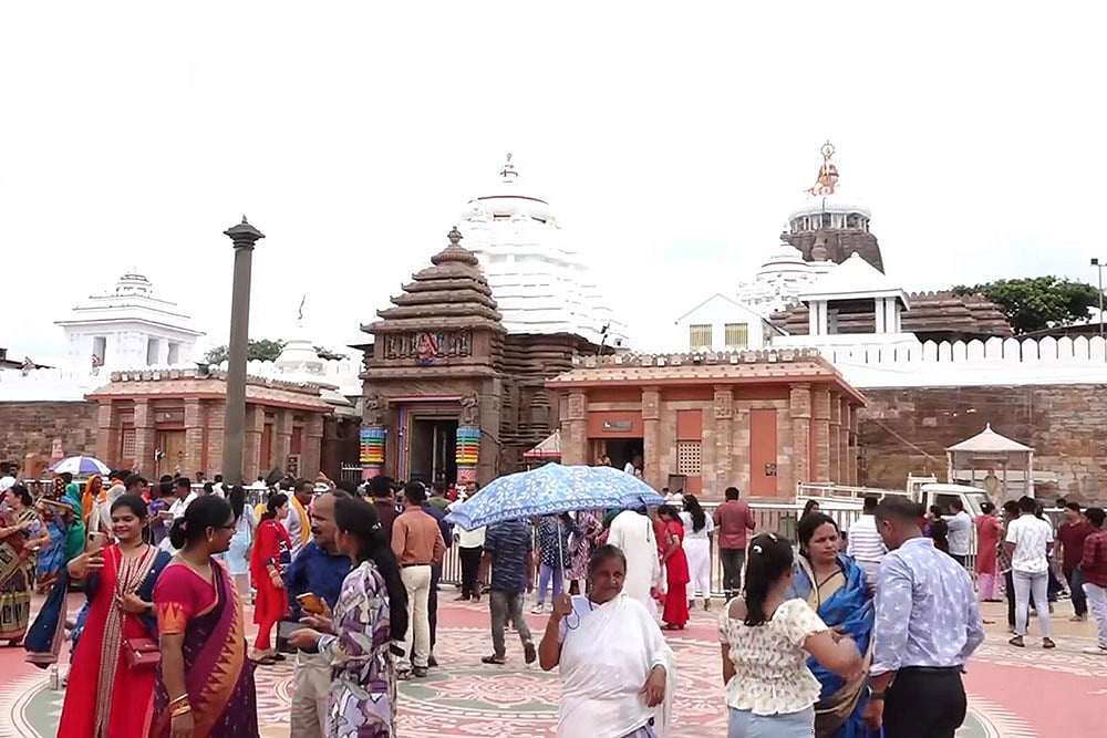 Photo: PTI : Devotees at Jagannath Temple