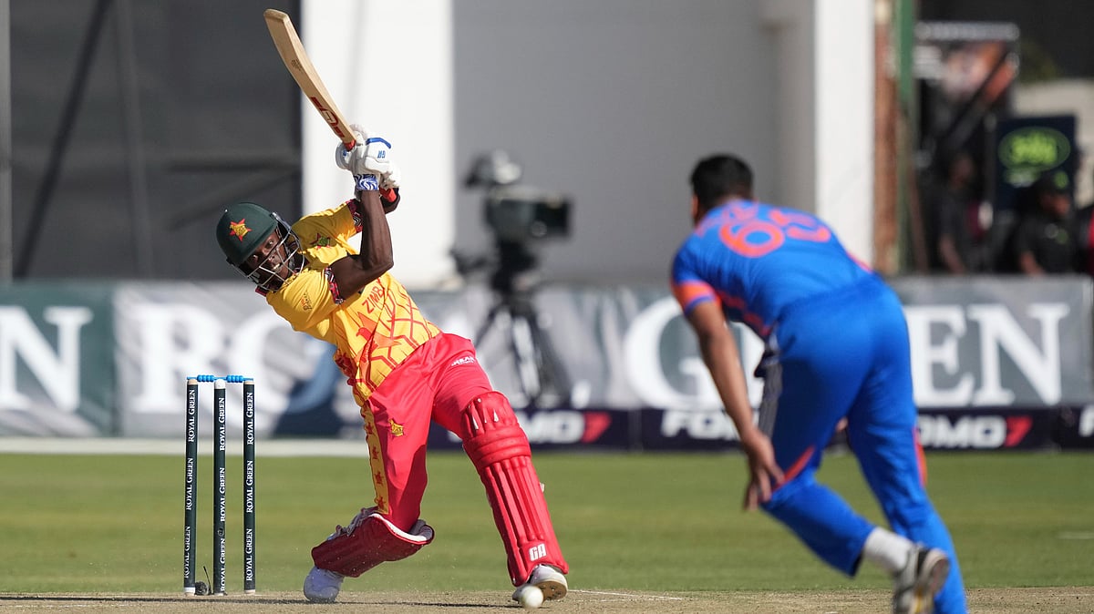 Zimbabwes batsman Clive Madande, left, plays a shot during the T20 cricket match against India at Harare Sports Club. AP Photo