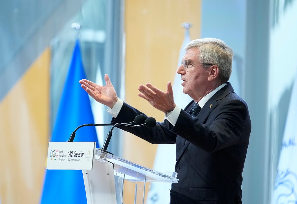 AP : IOC President Thomas Bach speaks during the IOC Session Opening Ceremony at the Louis Vuitton Foundation ahead of the 2024 Summer Olympics, Monday, July 22, 2024, in Paris, France