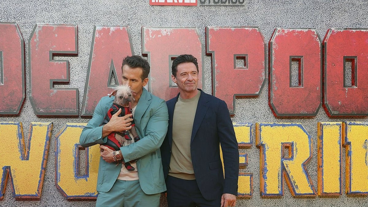 Getty images : Peggy with Ryan Reynolds (L) and Hugh Jackman. 