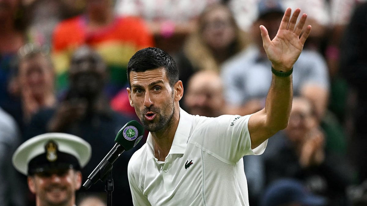 Novak Djokovic waves goodbye to his doubters after Monday's victory at Wimbledon - null
