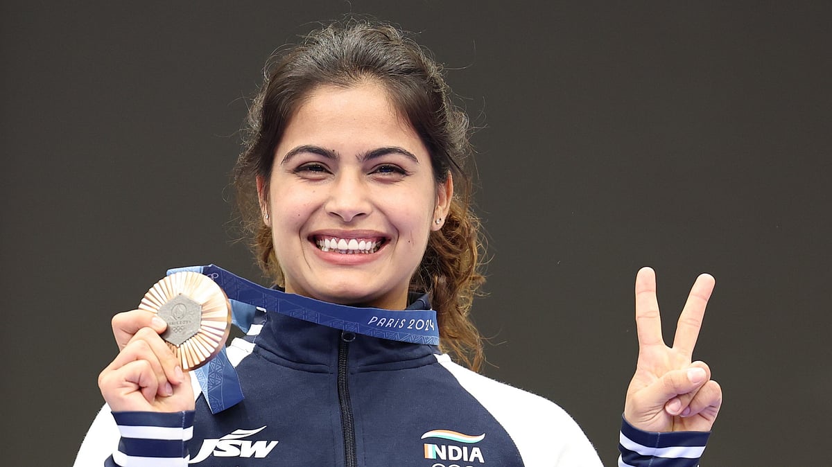Bronze medalist Manu Bhaker of India poses during the medal ceremony for the 10m Air Pistol Women event of the Shooting competitions in the Paris 2024 Olympic Games at the Shooting centre in Chateauroux, France, 28 July 2024. - PTI