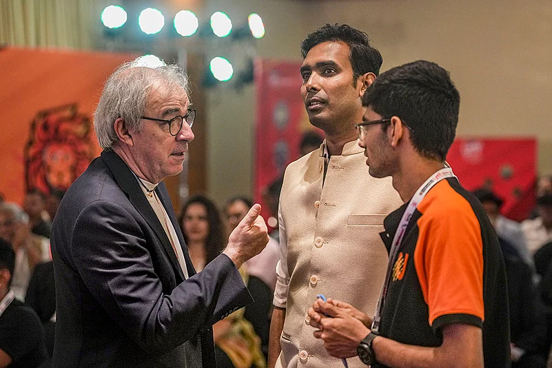 Sharath Kamal and Manav Thakkar with Coach Massimo Costantini during
Ultimate Table Tennis 2024 Player Draft