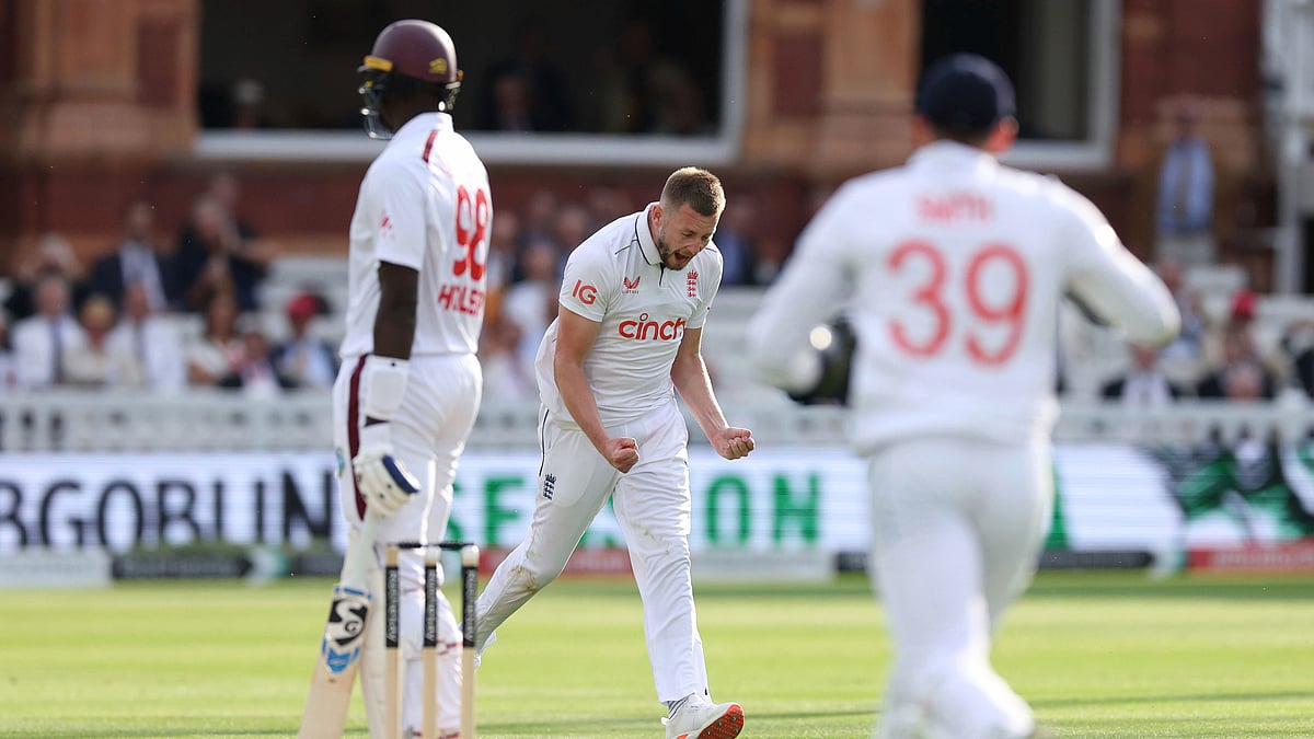 Steven Paston/PA via AP : England's Gus Atkinson, centre, celebrates taking the wicket of West Indies' Jason Holder on day two of the first Test match between England and West Indies at Lord's Cricket Ground, London.