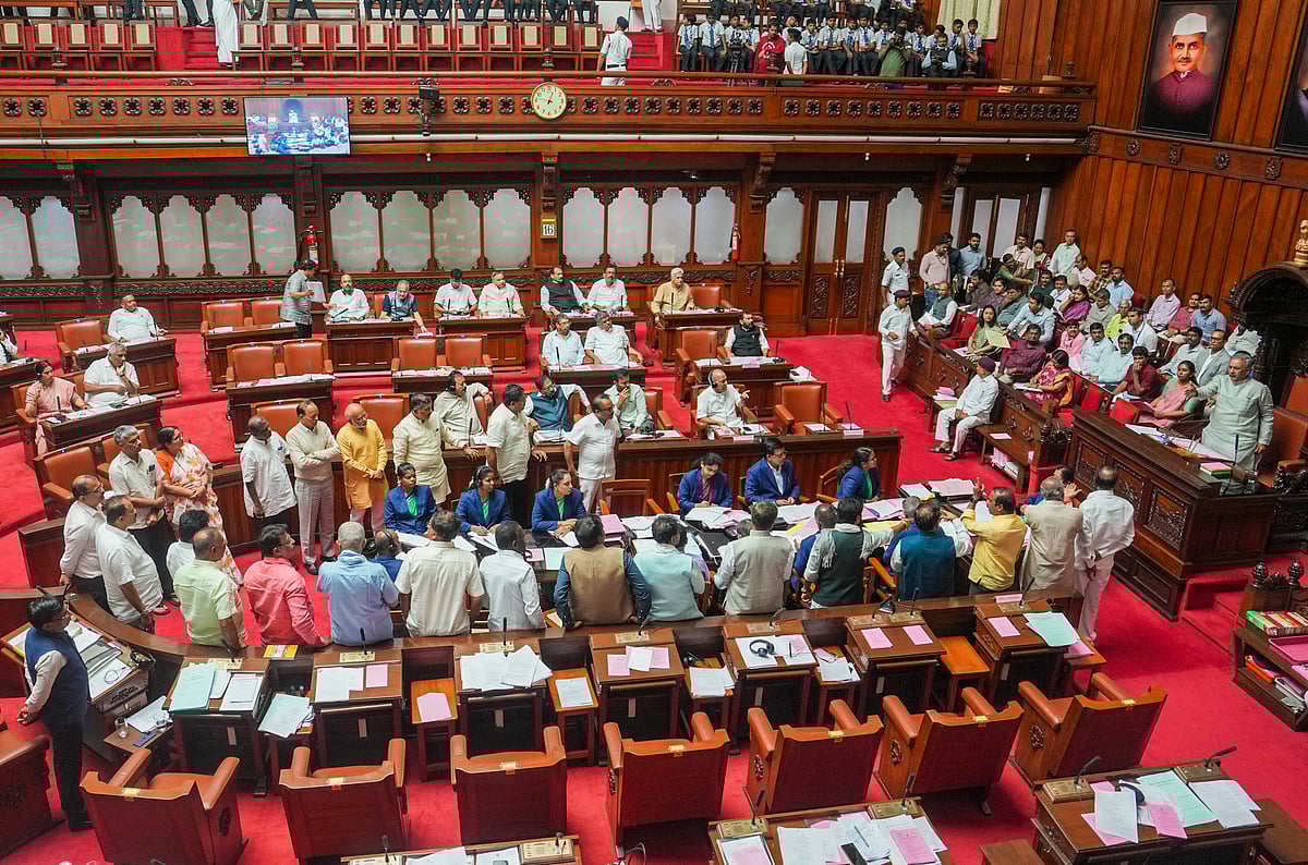 PTI : BJP and JD(S) MLCs protest in the well during a session of the Karnataka Legislative Council, at Vidhan Soudha in Bengaluru, Tuesday, July 16, 2024.