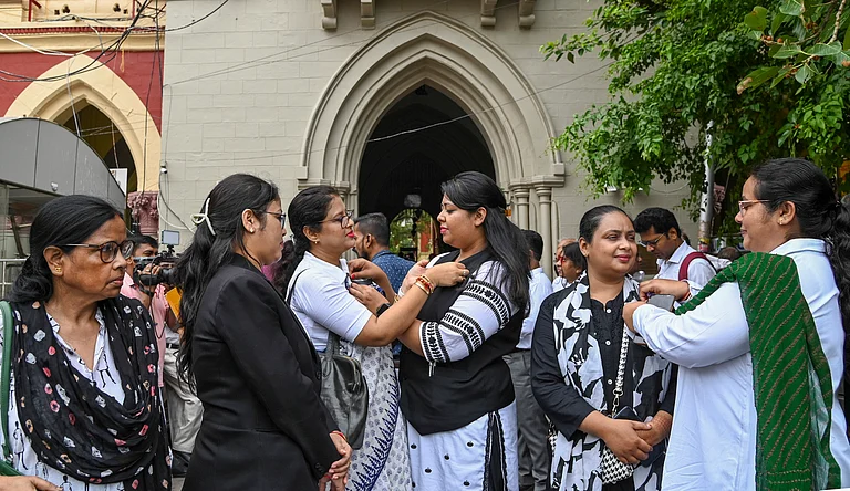 Lawyers wear black ribbon as they observe of black day in protest against implementation of the three new criminal laws, in Kolkata, Monday, July 1, 2024. - (PTI Photo)