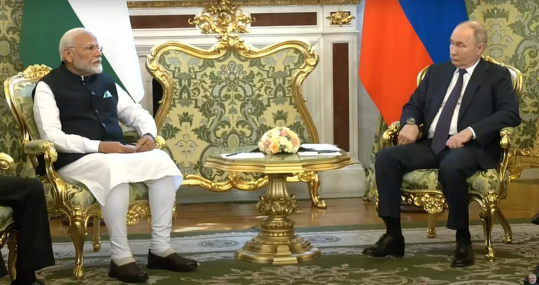 PM Modi and Putin meeting in Russia - PTI