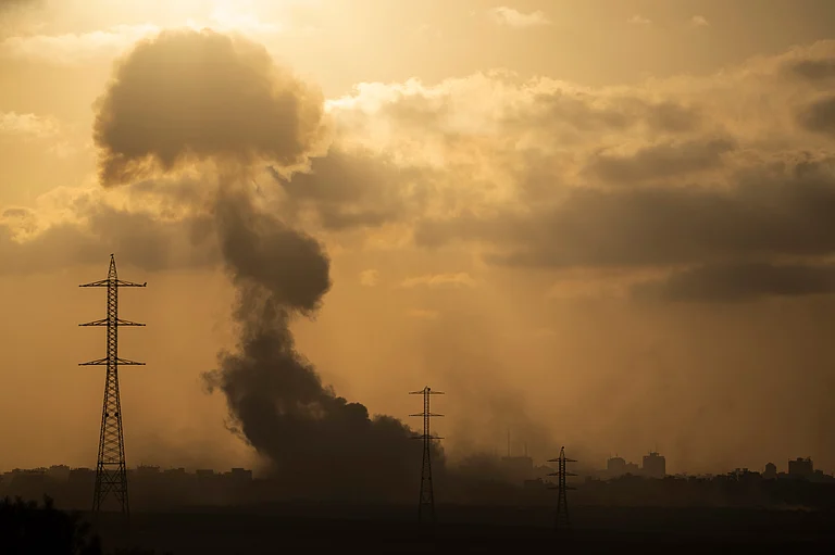 Smoke rises to the sky after an explosion in the Gaza Strip as seen from southern Israel. | - AP