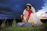 Photo: Prashant Panjiar : From the Launch Issue: Photograph of Phool Devi demonstrating how dais strangled newborns in Bihar