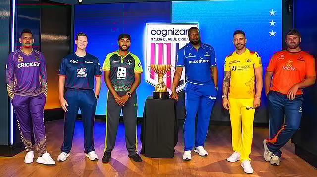 X/TexasSuperKings : The captains posing with the Major League Cricket 2024 trophy.