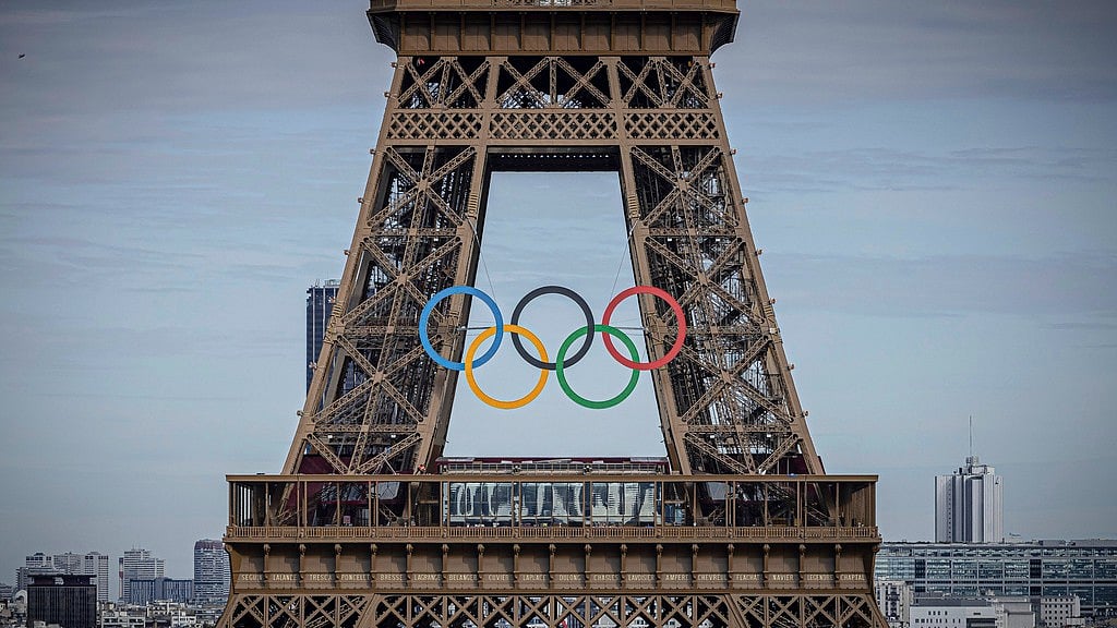 AP/Aurelien Morissard : Olympic rings are seen on the Eiffel Tower.